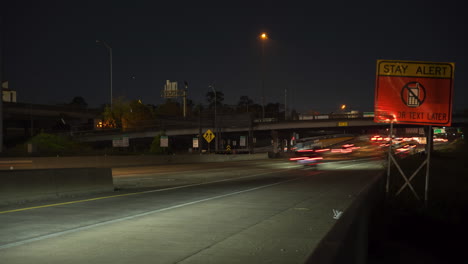 Time-lapse-of-cars-on-freeway-at-night