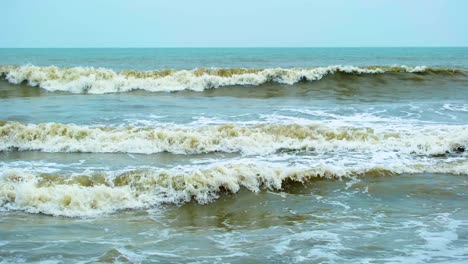 Slow-motion-clip-of-waves-in-the-sea-seen-from-the-beach