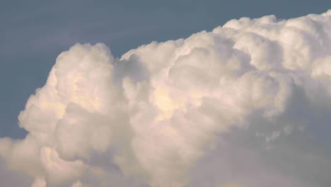 Billowing-clouds,-cumulonembus-growing-a-storm