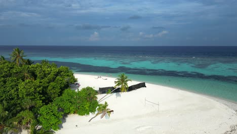 Close-up-aerial-view-of-the-white-sands-of-Bikini-Beach,-Dhangethi,-Maldives,-Indian-Ocean