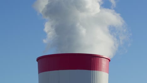Coal-fired-power-station-plant-Smoke-Steam-Chimney-close-up-sunny-clear-sky-day