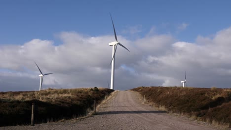 Windfarm-with-a-road-to-a-turbine