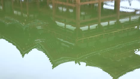 Reflection-Of-Phoenix-Hall-At-Byodo-In-Located-In-Uji-From-Pond-Lake