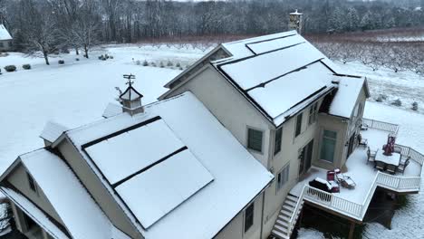 Solar-panels-covered-in-snow-in-New-England,-USA