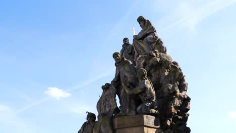 Statues-of-John-of-Matha,-Felix-of-Valois-and-Saint-Ivan-on-Charles-Bridge-in-Prague,-Czech-Republic