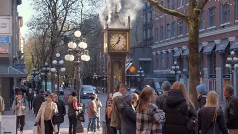 The-Steam-Clock-in-Gastown-Draws-a-Congregation-of-People---Vancouver,-Canada---Static-Shot