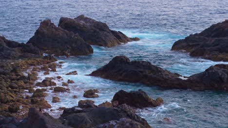 Dreamy-seascape-landscape-in-exotic-volcanic-rocky-coast,-Tenerife,-slowmo