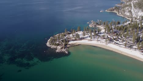 A-high-flying,-4K-drone-shot-over-Lake-Tahoe,-California,-during-the-winter-season