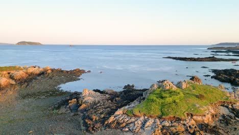 Guernsey-North-East-coast-slow-backwards-shot-across-Little-Russell-Channel-across-to-Jethou-and-view-of-St-Sampson-in-distance