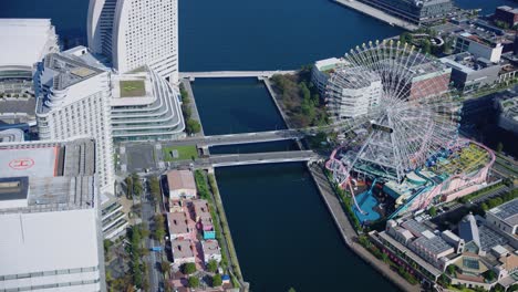 Yokohama-Minatomirai-Port-Area-and-Ferris-Wheel,-High-Angle-Establishing-Shot