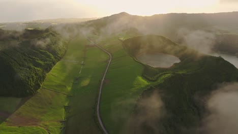Low-clouds-at-Lagoa-das-Sete-Cidades-Sao-miguel-during-sunset---Drone-shot