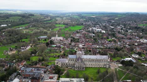 Reveal-shot-of-Winchester-Cathedral-and-surroundings-from-the-air-showing-City-Centre
