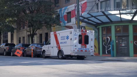 A-Sight-of-Ambulance-in-Cordova-Street,-Vancouver,-British-Columbia,-Canada---Medium-Shot