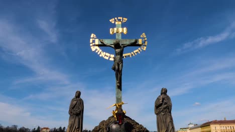 The-Crucifix-and-Calvary-statues-on-Charles-Bridge-in-Prague,-Czech-Republic
