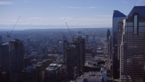Calgary-skyscrapers-construction-cranes-downtown-street