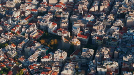Pan-down-aerial-shot-over-beautiful-church-in-central-Athens