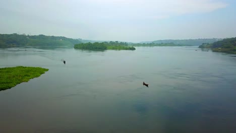 Wooden-Boat-On-The-Nile-River-In-Jinja,-Uganda,-Africa