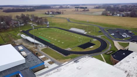 Sheridan,-Indiana-football-field-aerial-view-circling-oval-pitch-with-field-markings