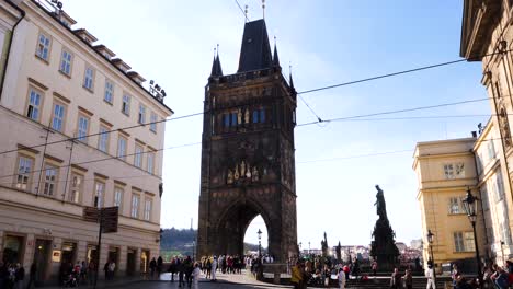 Tourists-visiting-Křižovnické-Square,-Old-Town-Bridge-Tower,-Karel-IV