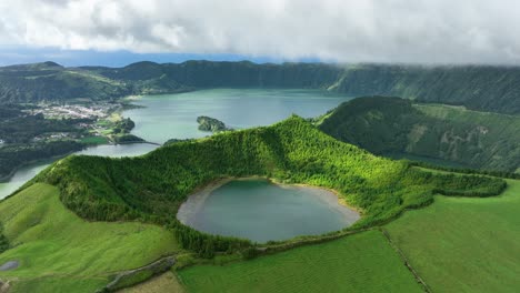Aerial-over-Rasa-Lagoon-with-panoramic-view-over-Sete-Cidades-caldera,-Azores