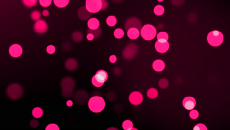 Pink-animation-of-particle-circles-forming-bokeh-background