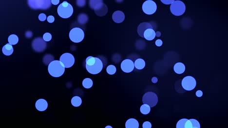 Animation-of-blue-particle-circles-moving-on-bokeh-background