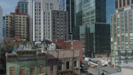 Establishing-tilt-up-shot-of-The-Spiral-66-Hudson-Boulevard-skyscraper-in-New-York-City---Midtown-Manhattan---day