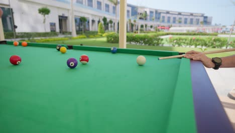 billiard-competition-between-young-men-in-the-hall-insert-shot,-tracking-shot