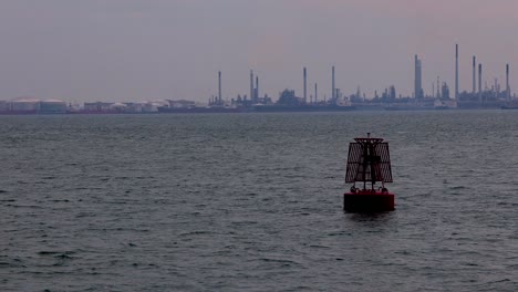 A-life-buoy-floating-in-the-open-sea-with-the-view-of-Bukom-Island-behind