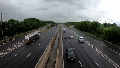 Timelapse-of-busy-motorway-on-a-grey-cloudy-day
