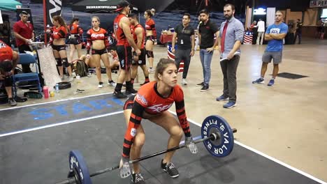 Woman-deadlifts-weight-in-crossfit-competition