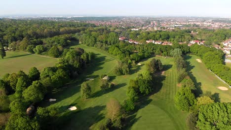 Aerial-Backward-Flyover-of-English-Golf-Course