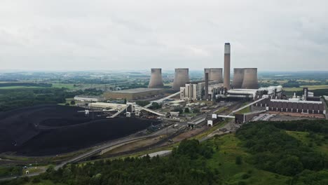 Aerial-drone-reveal-of-a-large-coal-powered-industrial-power-station