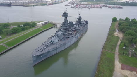 Aerial-view-of-the-historical-battleship-of-Texas-resting-in-the-Trinity-bay