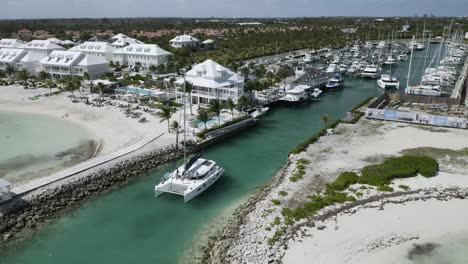 Sailboat-in-Boat-Marina-in-Bahamas-Tropical-Environment,-Aerial-Drone