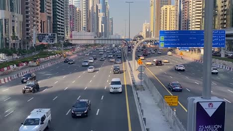 the-traffic-of-Sheikh-Zayed-Rd-during-sunset-time-in-Dubai,-United-Arab-Emirates