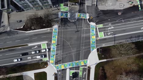 Rising-up-aerial-shot-of-UBC's-new-intersection-featuring-colourful-camo-crosswalks