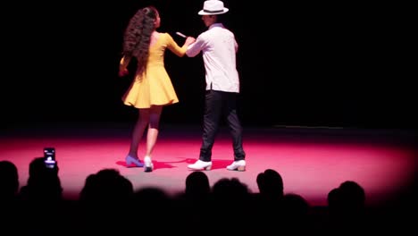 A-couple-of-mexican-teenagers-performing-a-Danzon-dance