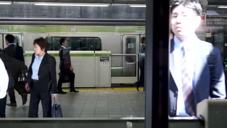 Inside-Train-Coming-Into-Station-in-Japan