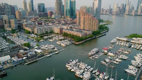 Aerial-Orbit-of-Marina-in-Jersey-City-Revealing-Manhattan-Skyline-at-Dusk