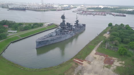 Battleship-Texas-docking-peacefully-in-the-Trinity-Bay,-near-Houston-Texas