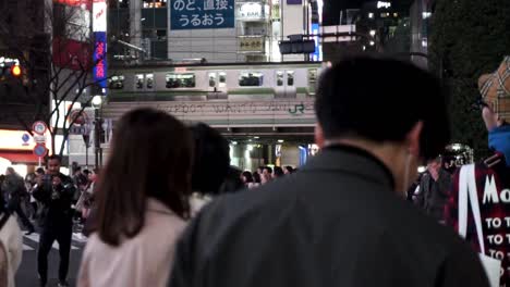 Shibuya-Crossing-at-Night-with-Train