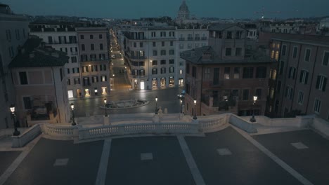 Aerial-drone-view-low-over-the-Spanish-steps,-gloomy,-evening-in-Rome,-Italy