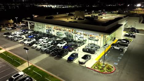 Valencia-BMW-luxury-car-dealership---nighttime-aerial-flyover