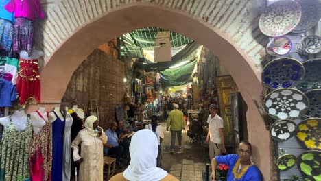Slow-motion-gimbal-shot-walking-through-souks-and-market-in-Morocco