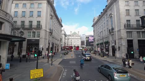 Timelapse-from-London-Bus-front-seat-of-people,-buses-and-traffic-with-sight-of-piccadilly-circus-and-regent-street