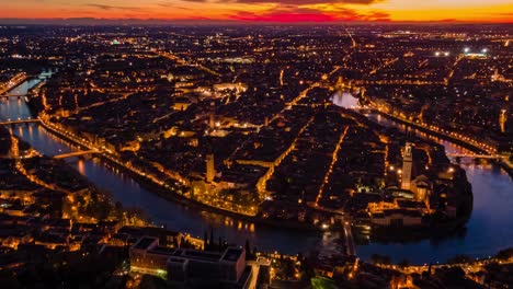 Aerial-Hyperlapse-of-Verona,-the-City-of-Love-in-Italy-during-Emotional-Sunset
