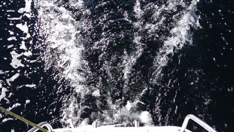 steady-camera-high-angle-of-the-wake-from-the-propeller-on-a-yacht