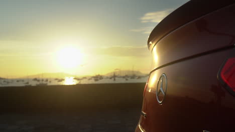 Mercedes-Benz-AMG-GLC43-showing-Logo-in-background-sunrise