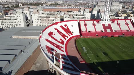 Camera-till-bottom-up-with-panoramic-aerial-view-of-empty-Huracan-football-club-stadium